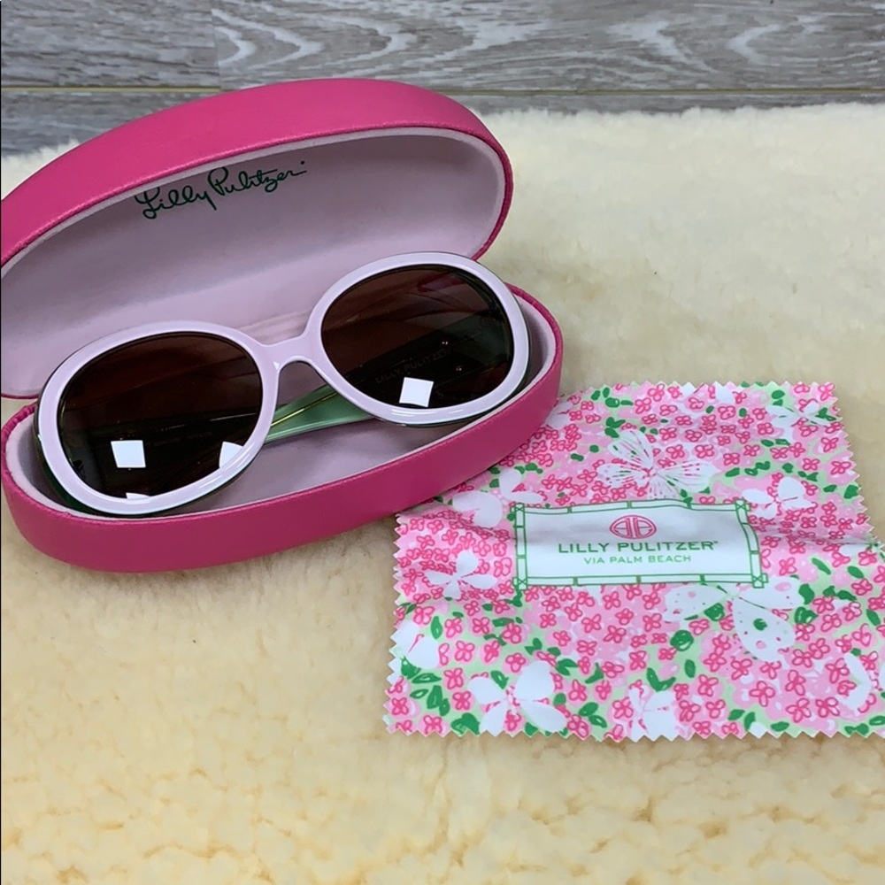 Lilly Pulitzer pale pink and green sunglasses.